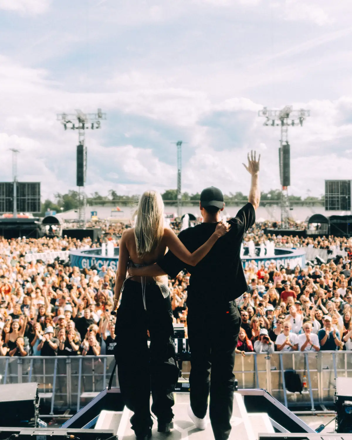 Glasperlenspiel on a festival stage in front of a huge crowd