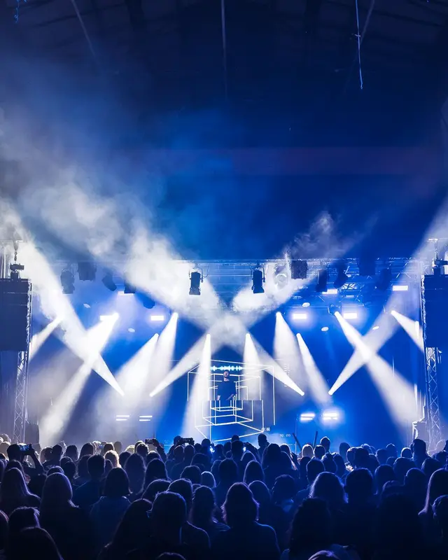 Laser beams across a concert hall